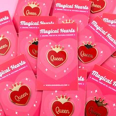 lots of pink cards with red hearts and crowns on them that say queen, heart shaped