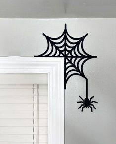 Spook up your home with these easy and affordable DIY Halloween decorations! 🎃👻 #DIYHalloween #HalloweenDecor #HalloweenDIY #DIYDecor #HalloweenCrafts #DIYProjects #HalloweenInspo #HalloweenIdeas #DIYHomeDecor" Halloween Mirror Decor, Spider Web Window, Window Mirrors, Hanging Spider, Halloween Mirror, Door Topper, Topper Halloween, Halloween Creatures, 3d Door