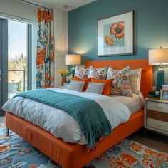 a bedroom with blue walls and orange bedding