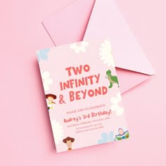 two infinity and beyond birthday card with envelope on pink background, top view