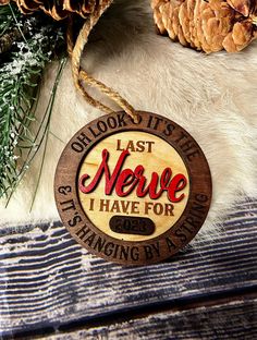 a wooden ornament that says, outdoors it's last neve i have for christmas