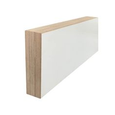 white plywood board with wood grains on the bottom and sides, in front of a