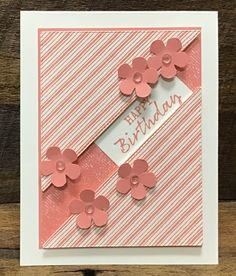 a birthday card with pink flowers on it