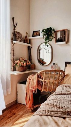 a bedroom with a bed, mirror and shelves on the wall next to a window