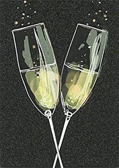 two champagne flutes with bubbles on a black background