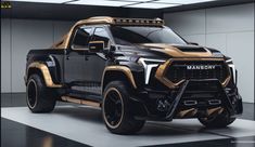 a black and gold truck is parked in a room with lights on it's sides