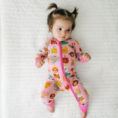 Child laying on a bed wearing a Pink Party Pals zippy Pretty Pink Background, Birthday Vibes, Pink Party, Pink Parties, Giraffes, Cute Creatures, Animal Party, Pretty Pink, Birthday Outfit