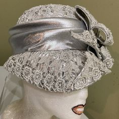 Silver Lace Over Silver Lam’e Cloche, Adorned With Silver Beads. See Pics And Please Take Time To Look At All Of The Hats In My Collection. Elegant Fitted Lined Hats, Elegant Evening Holiday Hats, Elegant Embellished Hat With Curved Brim, Elegant Embellished Hats With Curved Brim, Formal Fitted Embellished Hat, Elegant Silver Hat For Evening, Elegant Embellished Hats For Formal Occasions, Elegant Embellished Formal Hats, Silver Fitted Hat For Formal Occasions