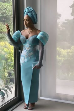 A perfect outfit for couples on their wedding or anniversary and it's also a perfect outfit for photoshoots. Proudly African Send in your measurements as follows when ordering: BRIDE a. Burst b. Waist c. Shoulder d. Sleeve length e. Round sleeve f. Hips g. Skirt length h. Half Length  i.  Top Length (if applicable) GROOM a. Long sleeve hand length b. Trouser length c. Chest d. Desired agbada length e. Waist f. Shoulder g. Top length This is a beautiful piece that will have you looking beautiful, classy, and stylish on your big day. Please do the following before placing your order; ✅ Write your phone number because courier services requires it for shipping ✅ Kindly measure and send in your exact measurement 💬 Please send us a message for further details or clarification. Ankara Maxi Dress Asoebi Traditional Weddings, Asooke And Lace Styles, African Mother Of The Bride Outfits, Ask Ebi Styles, Nigerian Women Fashion Traditional, Yoruba Bridal Traditional Dresses, Traditional Fitted Wedding Gown, Elegant Floor-length Gown For Wedding Reception, Fitted Long Sleeve Gown For Wedding