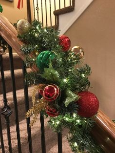 christmas decorations on the banisters and stairs