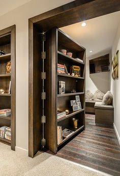 an open bookcase in the corner of a room with carpeted floor and walls