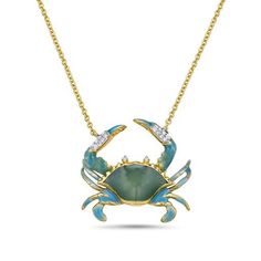 Introducing our vibrant 14K Enamel Blue Crab Pendant, accented with 18 Diamonds totaling 0.065 carat, elegantly suspended on an 18-inch cable chain. Crafted in radiant 14K yellow gold, this pendant is a colorful and stylish nod to the beauty of marine life. Metal: 14k Yellow Gold Material: Gold Color: Yellow Purity: 14K Stone Type: Diamond Stone Weight: 0.065 carat The focal point of this lively pendant is the intricately designed blue crab with enamel detailing, capturing the vibrancy of the se Luxury Ocean-inspired Jewelry With Starfish Charm, Sea Animals Jewelry, Crab Jewelry, Surf Jewelry, Sea Life Jewelry, Ocean Inspired Jewelry, Sea Jewelry, Blue Crab, Jewelry Accessories Ideas