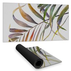 an abstract painting with leaves on the wall next to a black and white yoga mat