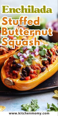 an enchilada stuffed butternut squash with black beans and cilantro