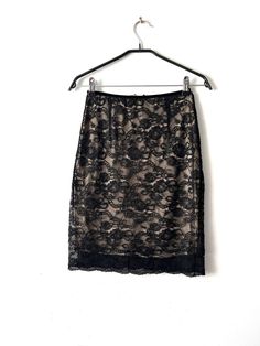 "Vintage Extra small formal skirt Black lace skirt Flowers lace knee skirt Romantic city women's skirt Formal High Waist pencil skirt Estimated size: XS Measurements: Length:  21.5\"/ 54.5 cm Waist:  24.5\"/ 62.2 cm stretchy hips: 33\"/ 84 cm stretchy Please check measurements to insure a proper fit. Remember to allow yourself some extra room for movement. You can compare these with something from your closet that fits you well. This skirt will come to you freshly laundered and ready to wear. Please feel free contact me if you need additional measurements or have any questions Condition: great vintage condition SHIPPING * I ship worldwide via Priority mail (Latvijas Pasts) from Latvia (EU). * I ship from Europe, so please allow 2 to 4 weeks for the package to arrive if you live overseas. * Party Skirt With Lace Patchwork, Elegant Skirt With Lace Patchwork, Elegant Lace Patchwork Skirt, Elegant Mini Skirt With Lace Trim, Elegant Fitted Skirt With Lace Patchwork, Chic Lined Lace Mini Skirt, Chic Lace Lined Mini Skirt, Chic Lace Mini Skirt With Lining, Chic Lace Mini Skirt With Lined Skirt