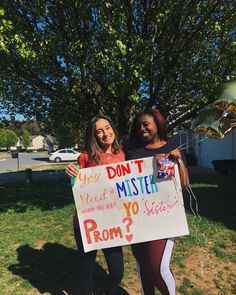 two women holding a sign that says you don't misstee when you get to prom