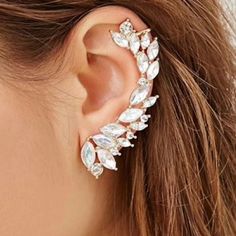 Full Ear Cuff In Silver And Gold Ear Crawler Stud Earring. Floral Clusters With Rhinestones And Pearls That Sparkle At Every Angle. Gift Box Included. $15.00 Each. Note: The One Showing On The Cover Photo, It's Not Longer Available. Full Ear Cuff Earrings, Ear Covering Earrings, Diamond Ear Cuff Earrings, Silver Crystal Ear Cuff For Party, Silver Ear Climbers For Party, Elegant Silver Crystal Ear Cuff, Elegant Silver Cartilage Earrings For Party, Silver Single Ear Climber For Party, Silver Metal Ear Climbers For Party