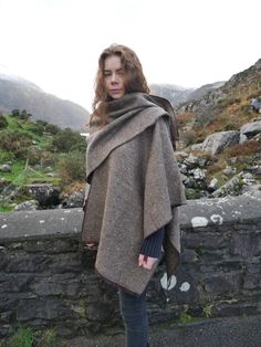 Irish tweed wrap, ruana - made by me! KateIrishTweedStore luxury capes are elegantly stylish and wrap you in warmth. They can be worn in all seasons and can cover a multitude of sins! They are both practical and hard wearing and their versatility means they look fantastic in the town or country and work for both special occasions or for every day wear. Models on pictures - myself and my husband Luke! - Extremely versatile wrap, - Can be worn so many ways - Can be worn 4 seasons a year. Perfect f Irish Clothing, Irish Tweed, Ruana Wrap, Donegal Tweed, Creative Mom, Killarney, Evening Walk, Fall Capsule Wardrobe, Wool Handmade