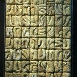 an image of some type of writing that is made out of clay and cement blocks