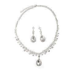 This bridal wedding jewelry set is simply stunning! This beautiful jewelry set is encrusted with clear, sparkling rhinestones in a sophisticated and elegant design. The necklace measures approximately 12" long with a 5.5" extender chain for just the right fit. The matching Earrings measure approximately 2" long and 3.6g in weight. This set is perfect for brides, bridesmaids, pageants or any special event. This set coordinates with any color or style wedding dress or formal ensemble. Wedding Jewelry Sets With Rhinestones And Dangle Earrings, Elegant Teardrop Rhinestone Jewelry Sets, Teardrop Cubic Zirconia Jewelry Sets With Rhinestones, Earrings Matching, Teardrop Dangle Earrings, Teardrop Necklace, Silver Crystal, Wedding Jewelry Sets, Stunning Jewellery