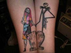 two people with tattoos on their legs