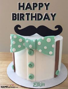 a birthday cake with a mustache and bow tie