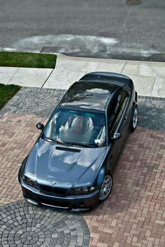 an aerial view of a car parked on the street