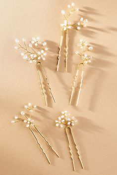 The Twigs & Honey Baby's Breath Freshwater Pearl Hair Pins beautifully combine the delicate charm of baby's breath with the elegance of freshwater pearls. | Baby's Breath Freshwater Pearl Hair Pins, Set of 5 by Twigs & Honey in Gold, Women's, Gold/Plated Brass/Freshwater Pearl at Anthropologie Pearl Bridal Comb, Pearl Comb, Gold Hair Clips, Sheer Wedding Dress, Pearl Hair Pins, Pearl Hair Clip, Wedding Hair Pins, Fancy Hairstyles, Baby's Breath