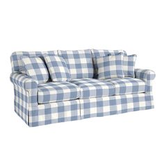 a blue and white checkered couch with pillows