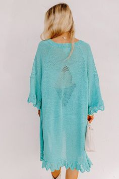 Relax in the summer evening breeze with this cute turquoise cardigan featuring lightweight knit material, oversized half sleeves, ruffle trim detailing, and a draped open front silhouette that falls into a straight mid-calf length hemline! Measurements S : Bust 46", Hip 44", Length 38", Sleeve Length 19", Waist 44". M : Bust 48", Hip 46", Length 39", Sleeve Length 19", Waist 46". L : Bust 50", Hip 46", Length 39", Sleeve Length 19.5", Waist 46". Flowy V-neck Cardigan For The Beach, Oversized V-neck Cardigan For Vacation, Solid Summer Cardigan With 3/4 Sleeve, Spring Knit Cover-up For Day Out, Summer Short Sleeve Layering Cardigan, Lightweight Oversized Cover-up For Spring, Summer Casual Cover-up For Layering, Summer V-neck Relaxed Fit Cardigan, Summer V-neck Solid Color Cardigan