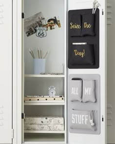 a white locker with black and gold magnets on the door, next to other items