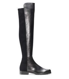 The iconic 5050 boots are instantly recognizable; note the distinctive just-over-the-knee front shaft, crafted from ultra-luxe nappa or suede, and the slightly shorter micro stretch back shaft  a SW signature detail meticulously engineered for a sleek silhouette and a flawless fit. Wear these A-lister wardrobe essentials with dresses or skinny jeans. 5050 Boots, Stuart Weitzman Lowland, Stuart Weitzman 5050, Leather Over The Knee Boots, How To Stretch Boots, Footwear Design Women, Stuart Weitzman Shoes, Designer Boots, Nappa Leather