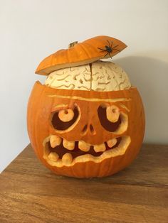 a pumpkin carved to look like a human head