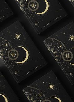 several black and gold greeting cards with stars, moon and planets on them in the middle