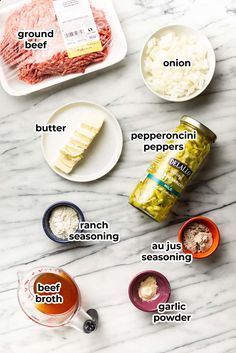 ingredients to make an italian meatloaf recipe laid out on a marble counter top