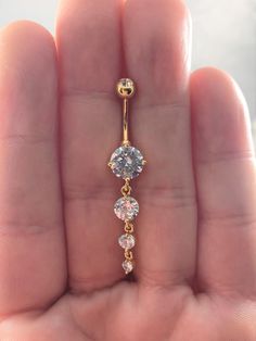 Golden Dangly 4 cz's long belly ring..14g..10mm(B06G) Dangly Gold Belly Rings, Dangle Belly Ring, Gold Belly Button Piercing Dangle, Dangly Belly Piercing Ideas, Long Belly Button Piercing, Belly Piercing Gold, Summer Belly Rings, Belly Button Piercing Cute, Cute Belly Rings