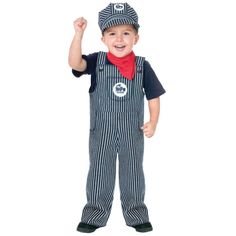 a young boy wearing overalls and a hat