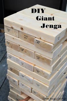 a stack of wooden blocks with the words diy giant game on them