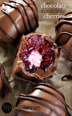 some chocolate covered strawberries are sitting on a table