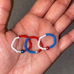 Brand New Handmade 4th Of July Glass Seed Bead Elastic Ring Set Handmade With Lots Of Love! 3 Rings. 2mm Crystal Glass Seed Beads. 4mm Glass Round Beads. High Quality Stretchy Elastic. The Elastic On These Rings Makes It Easy To Slide On/Off The Finger. Red, White & Blue. Fits Ring Sizes: 6-8. Super Cute & Trendy! Perfect For Everyday And Stacking With A Mix And Match Of Colors! Seed Bead Ring, Elastic Rings, Seed Bead Bracelets, Slide On, Ring Sizes, Glass Seed Beads, Beaded Rings, Clay Beads, Womens Jewelry Rings