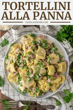 tortelli alla panna with peas and ham in a white bowl on a wooden table