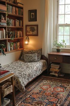 a bedroom with a bed, desk and bookshelf in the corner next to a window