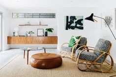 a living room filled with furniture and decor