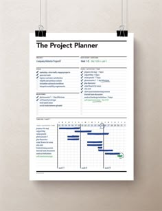 the project planner is hanging on a wall