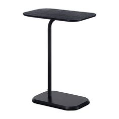 a black table with a metal base and a square top on an isolated white background