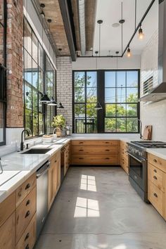 an industrial style kitchen with wooden cabinets and stainless steel appliances is featured in this photo