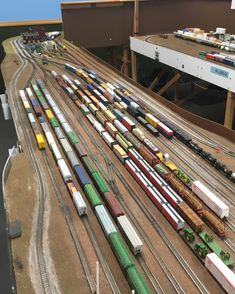 a model train set with multiple trains on the tracks