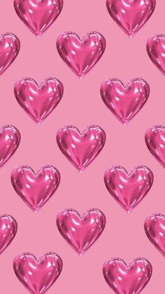 many shiny hearts on a pink background