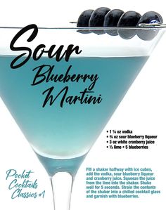 a blueberry martini with black olives on the rim and an advertise