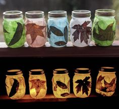 four jars with leaves painted on them